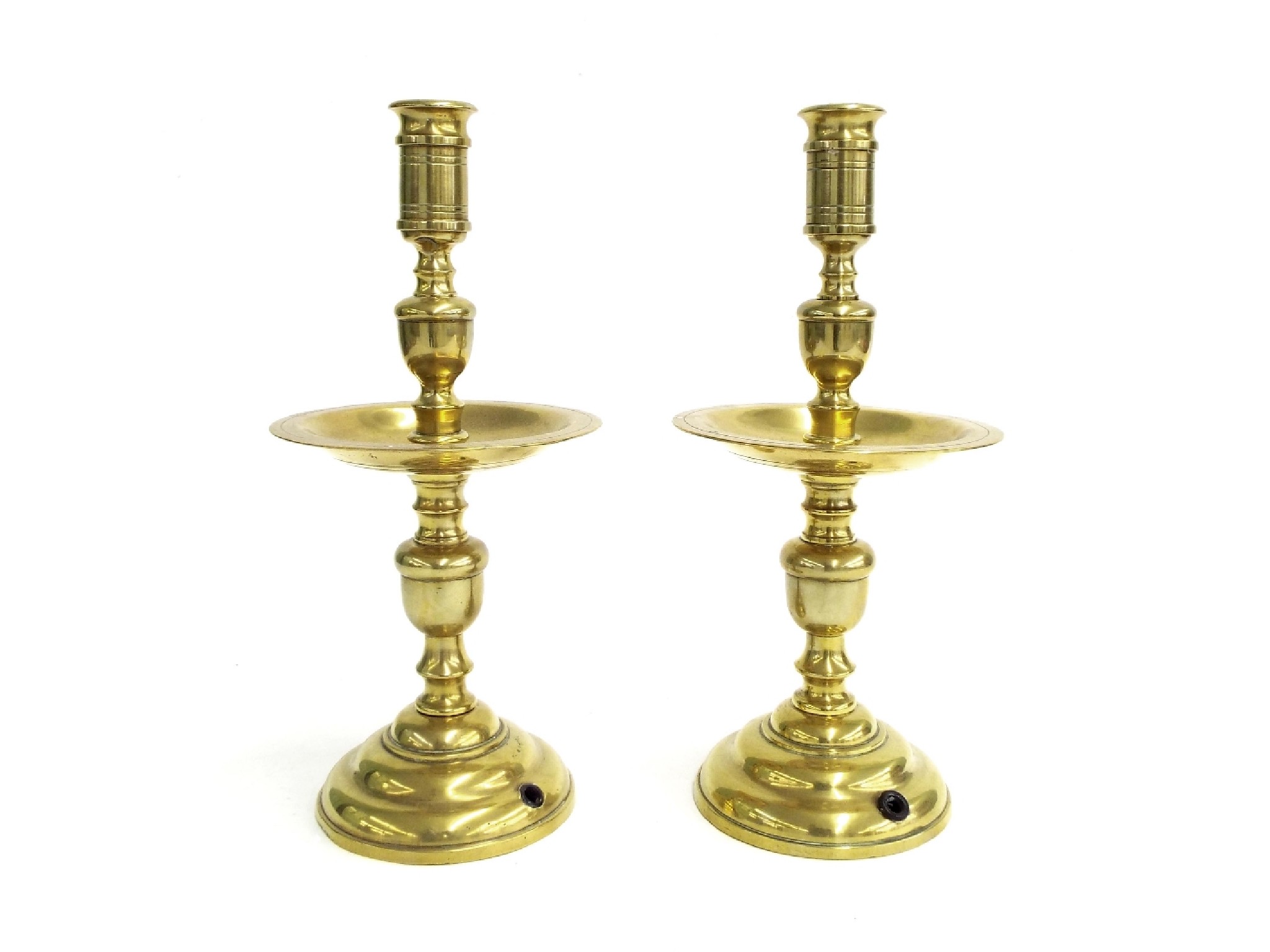 Appraisal: Pair of antique style brass candlesticks with drip trays high