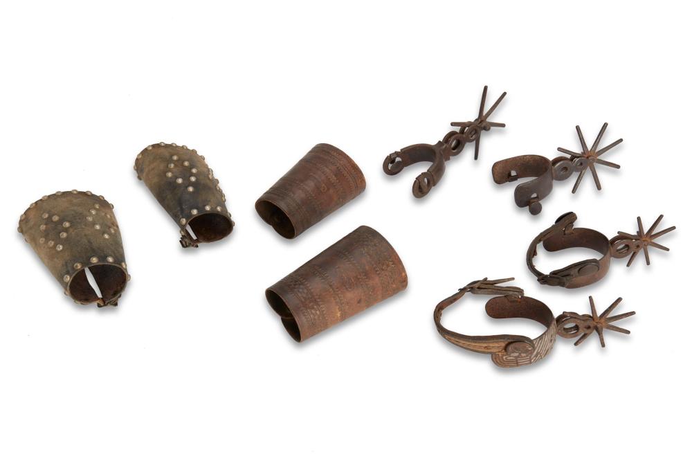 Appraisal: A group of spurs and gauntlets th century One pair