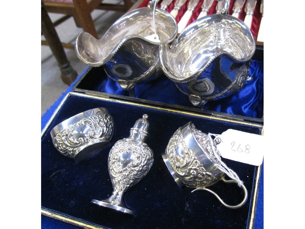 Appraisal: Lot comprising pair of silver plated sauce boats and a