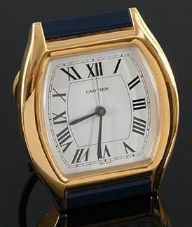 Appraisal: A Cartier Tortue alarm clock Quartz movement cream dial with