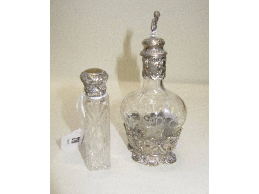 Appraisal: Lot comprising silver topped scent bottle and a Continental white