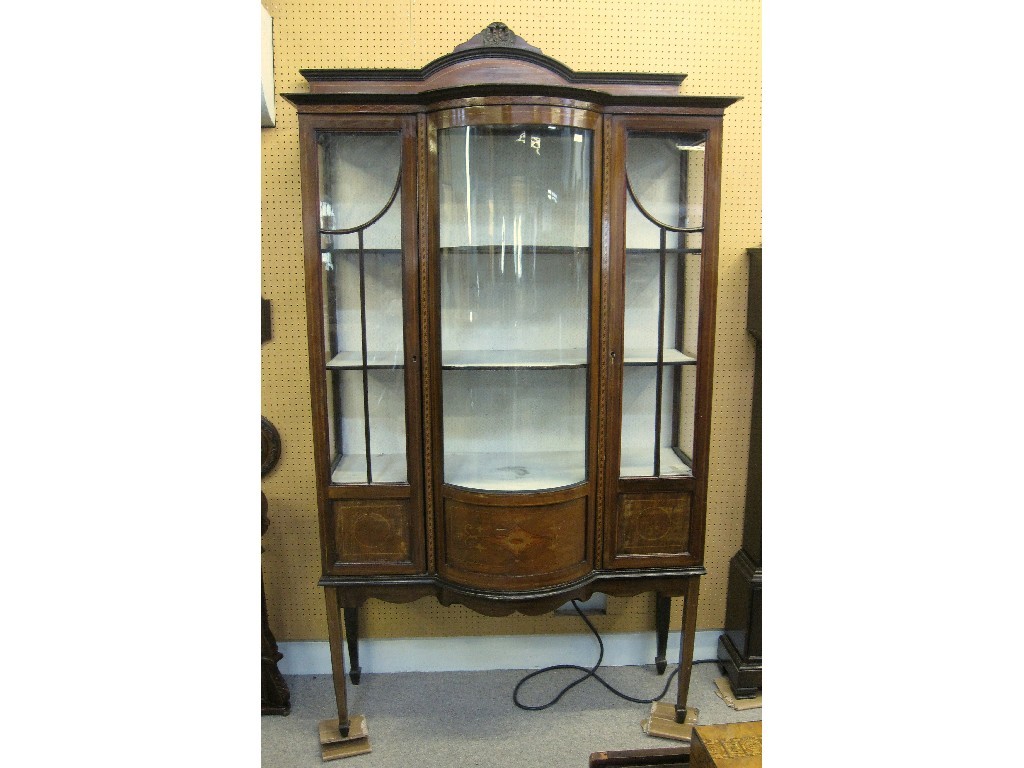 Appraisal: Edwardian mahogany and inlaid bow fronted display cabinet on square