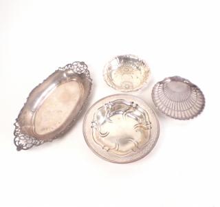 Appraisal: Four Sterling Articles Four sterling articles comprising Shell shaped dish