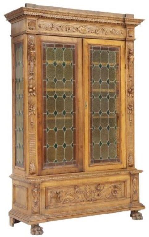 Appraisal: Italian Renaissance Revival walnut bookcase late th c shaped crest