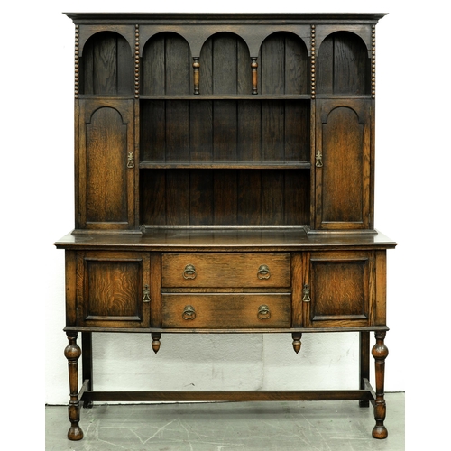 Appraisal: An oak dresser c the boarded rack with spice cupboards