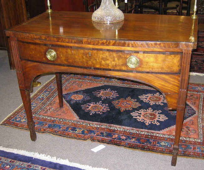 Appraisal: ENGLISH TH CENTURY MAHOGANY SIDEBOARD Crossbanded bow front top with