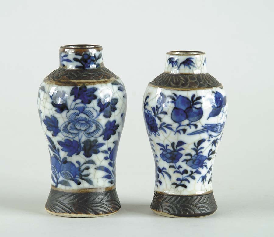 Appraisal: TWO SMALL BALUSTER SHAPED ORIENTAL VASES Crackle finish with blue