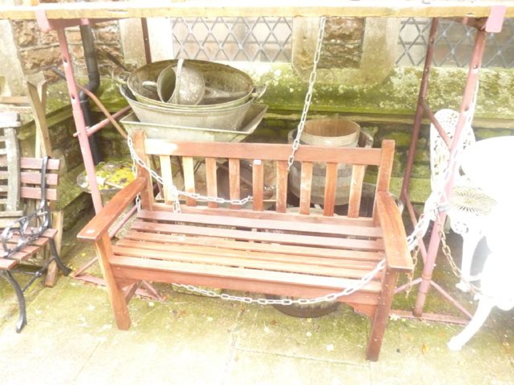 Appraisal: A stripped R A Lister teak two seat garden bench