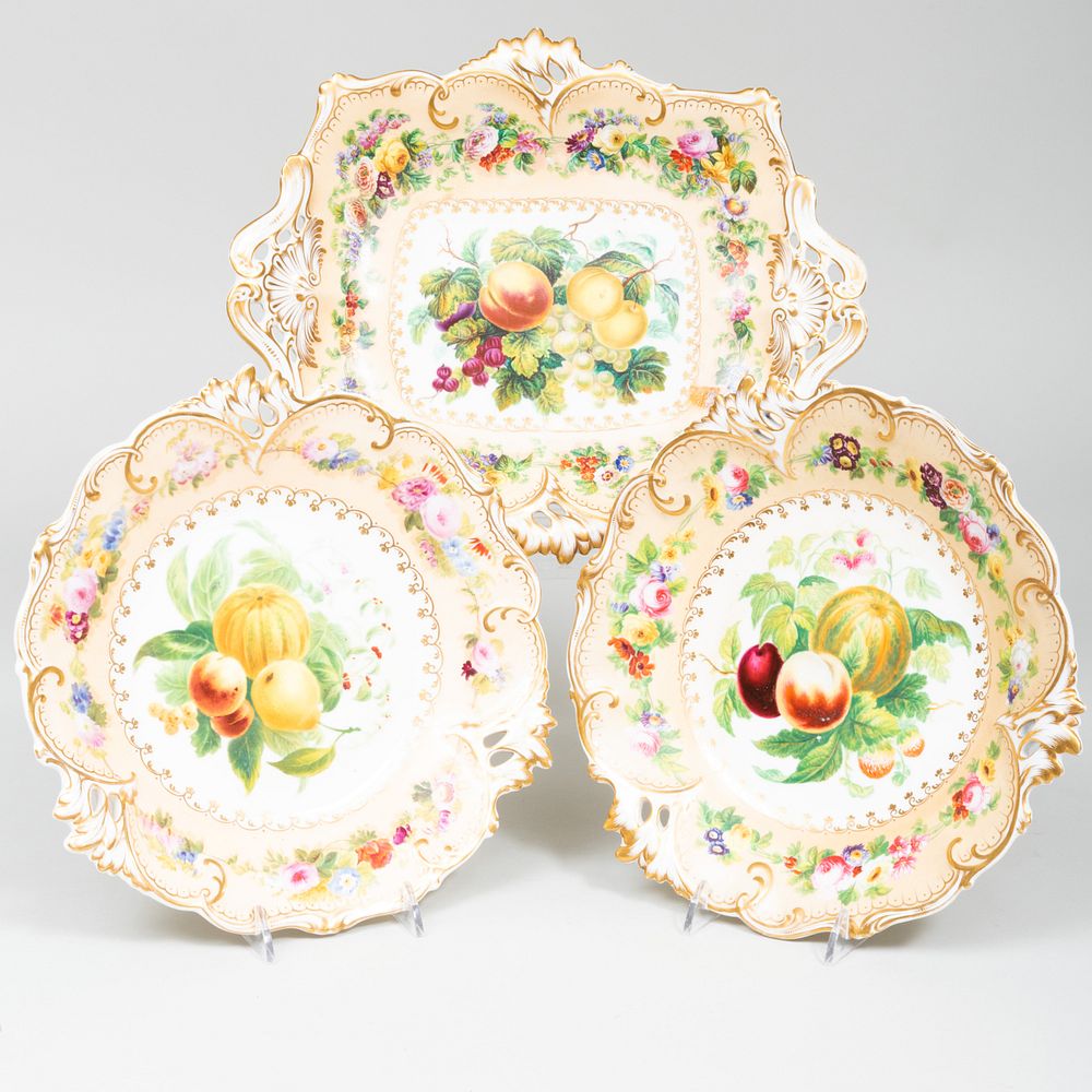 Appraisal: Three English Cream Ground Porcelain Compotes Decorated with Fruit Comprising