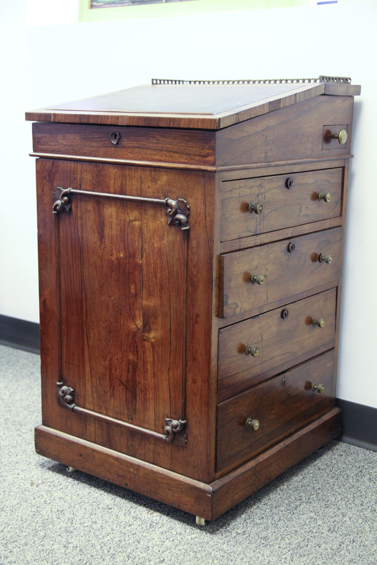 Appraisal: DAVENPORT DESK England early th century Mahogany veneered desk having