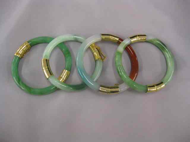 Appraisal: Chinese Jade Bracelets various colors gold-plated fittings