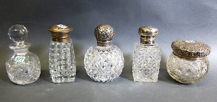 Appraisal: COLLECTION OF CUT CRYSTAL DRESSER BOTTLES five pieces with hallmarked