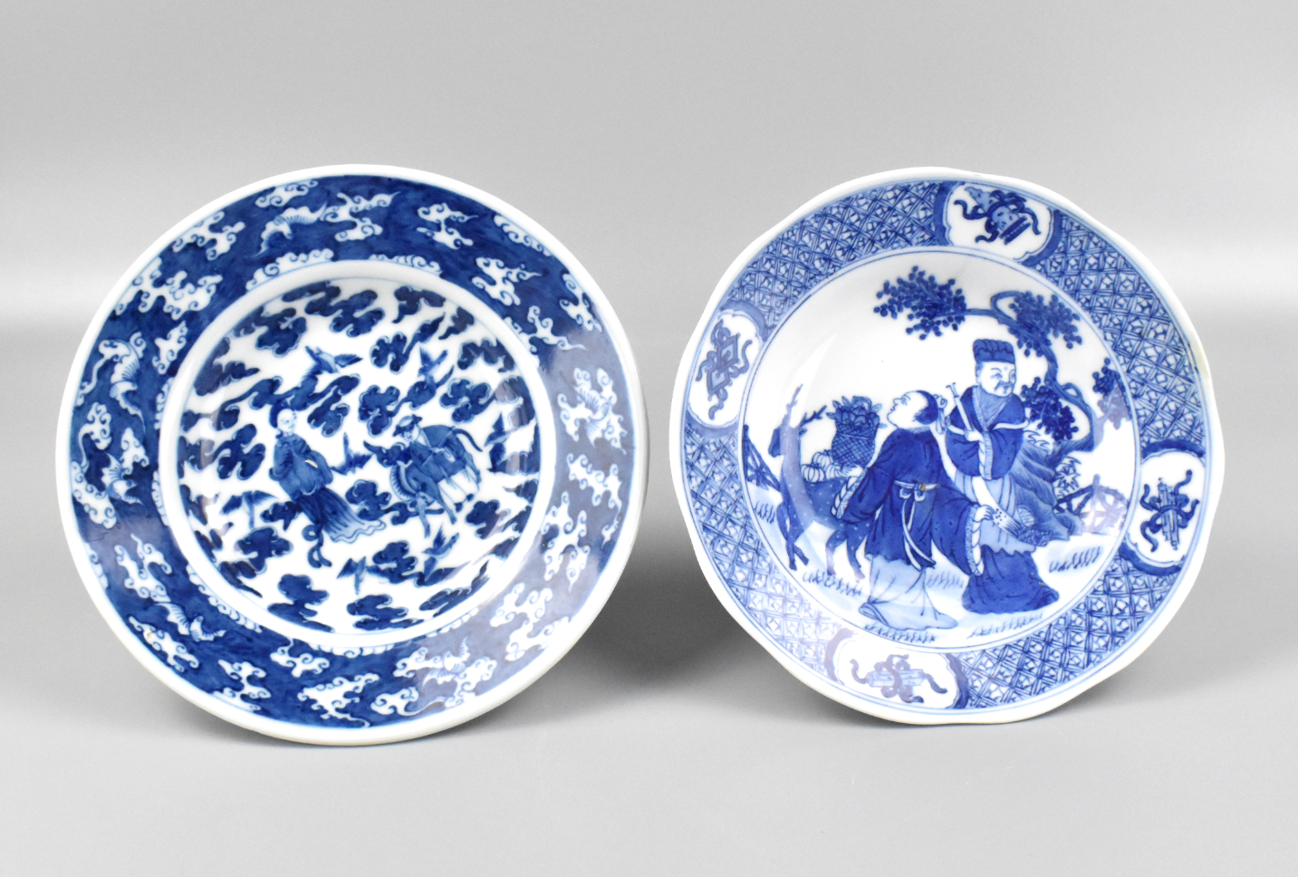 Appraisal: Two Chinese blue white plates with figures One plate slightly