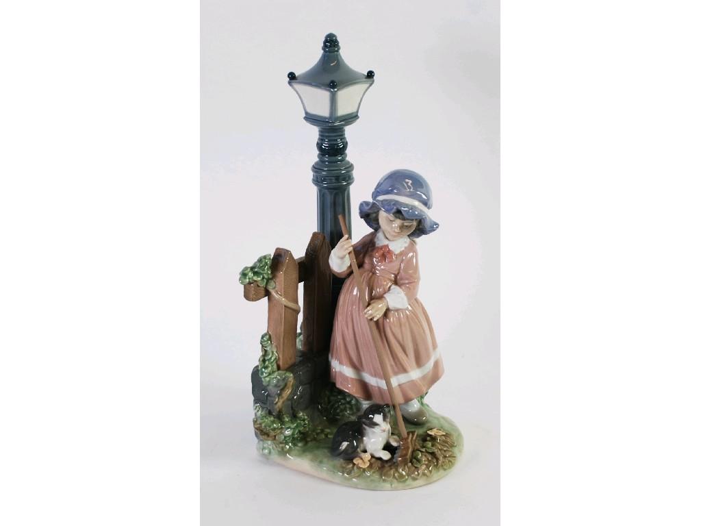 Appraisal: LLADRO PORCELAIN GROUP modelled as a young girl and cat