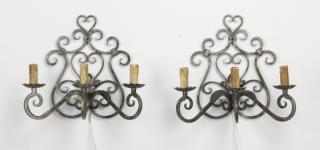 Appraisal: French wrought iron sconces Pair of early th century French