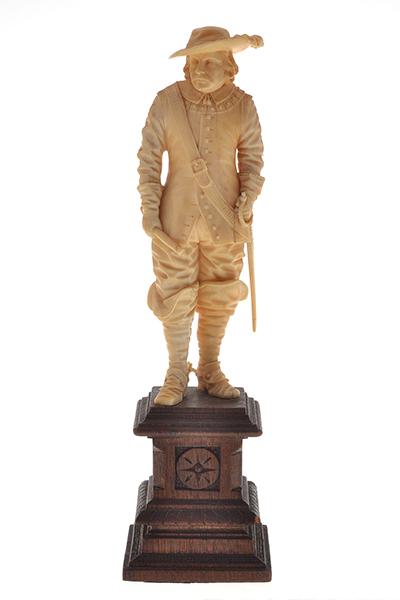 Appraisal: A DIEPPE IVORY FIGURE depicting a man in period costume