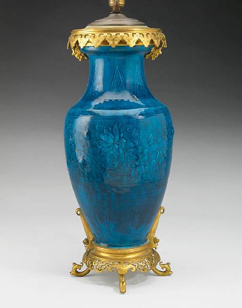 Appraisal: A French gilt bronze mounted Persian blue faience vase in