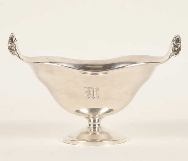 Appraisal: Tuttle sterling footed bowl with cast ram's head handles The