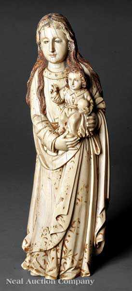 Appraisal: A Continental Stained and Gilt Decorated Ivory Figural Group of