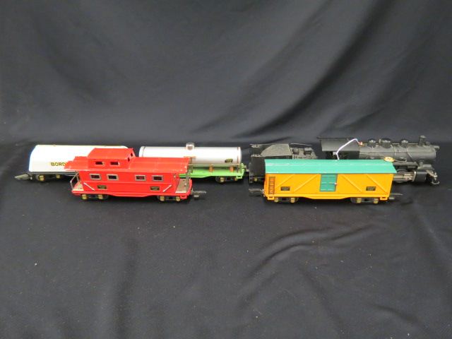 Appraisal: American Flyer Train Set tin engine with tender cars still