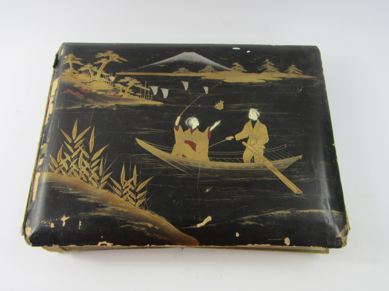 Appraisal: A thC Japanese lacquered album the boards set with figures