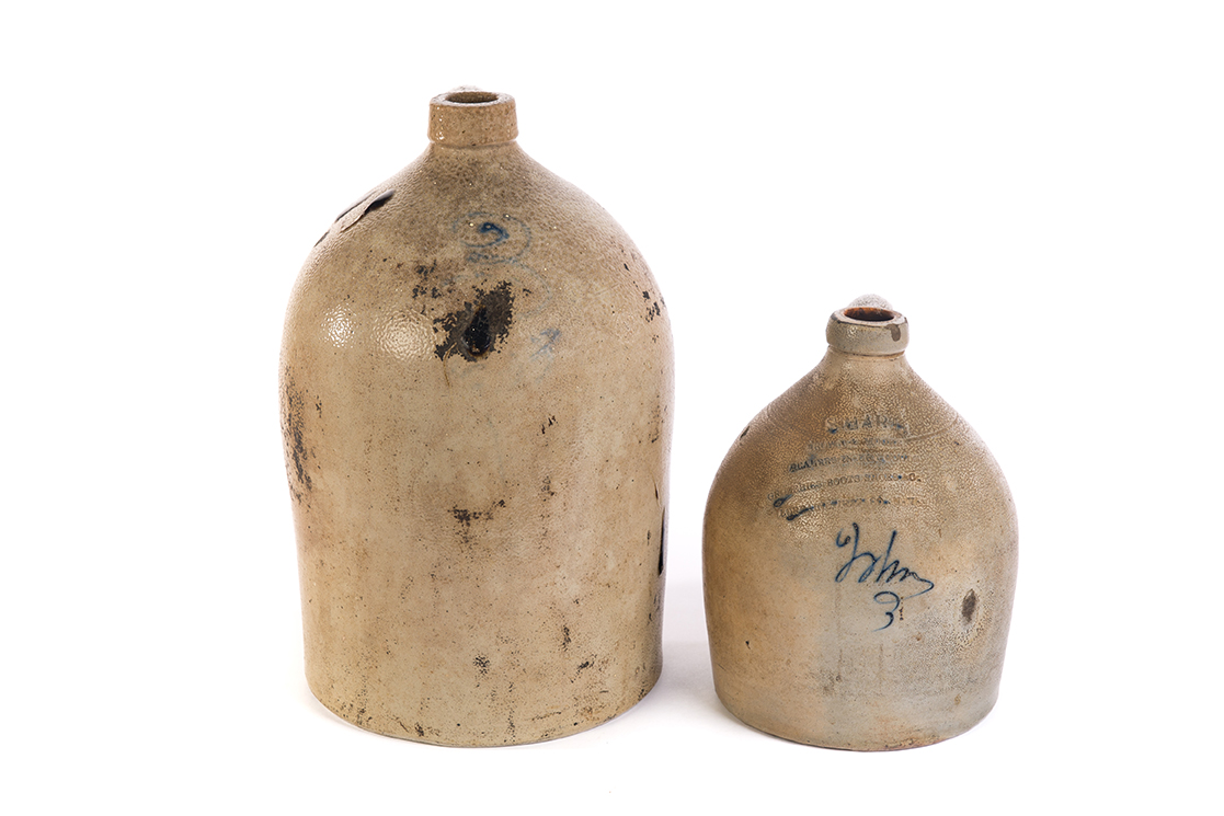 Appraisal: TWO STONEWARE JUGS American nd half- th century A three-gallon