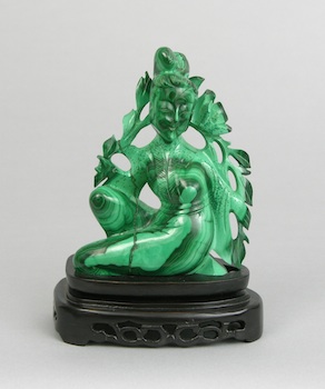 Appraisal: A Carved Malachite Figurine of a Seated Maiden Carved malachite