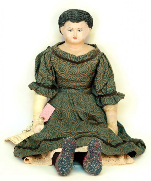 Appraisal: A Greiner doll Papier mache shoulder head with molded hair