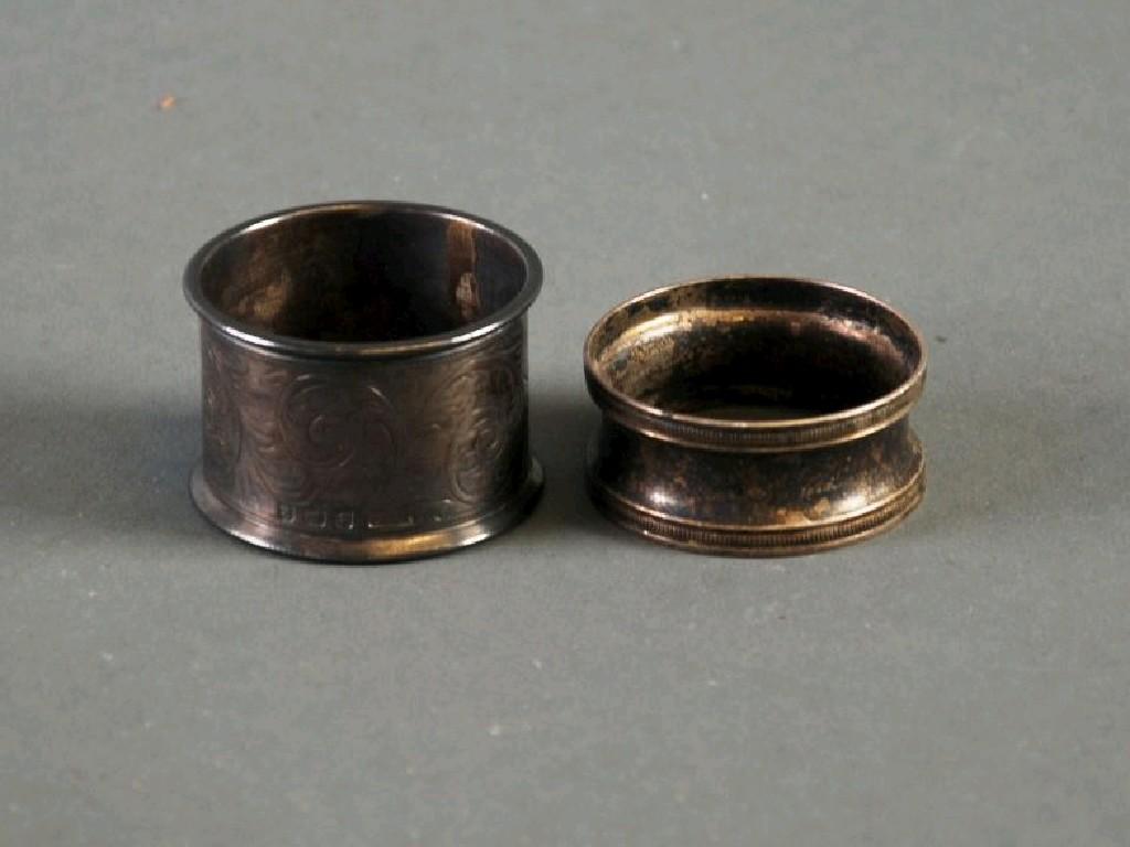 Appraisal: TWO SILVER NAPKIN RINGS one waisted with beaded border Sheffield