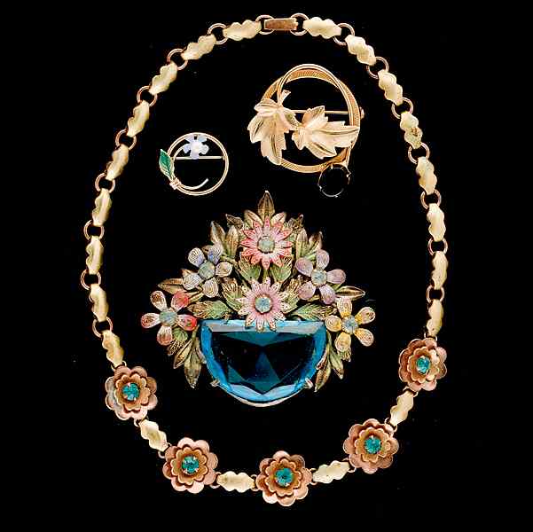 Appraisal: Unsigned Flower Brooch and Necklace Suite A grouping of three