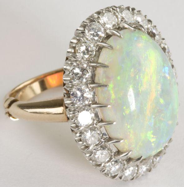 Appraisal: KT Opal and Diamond Cocktail Ring a stunning ring centering