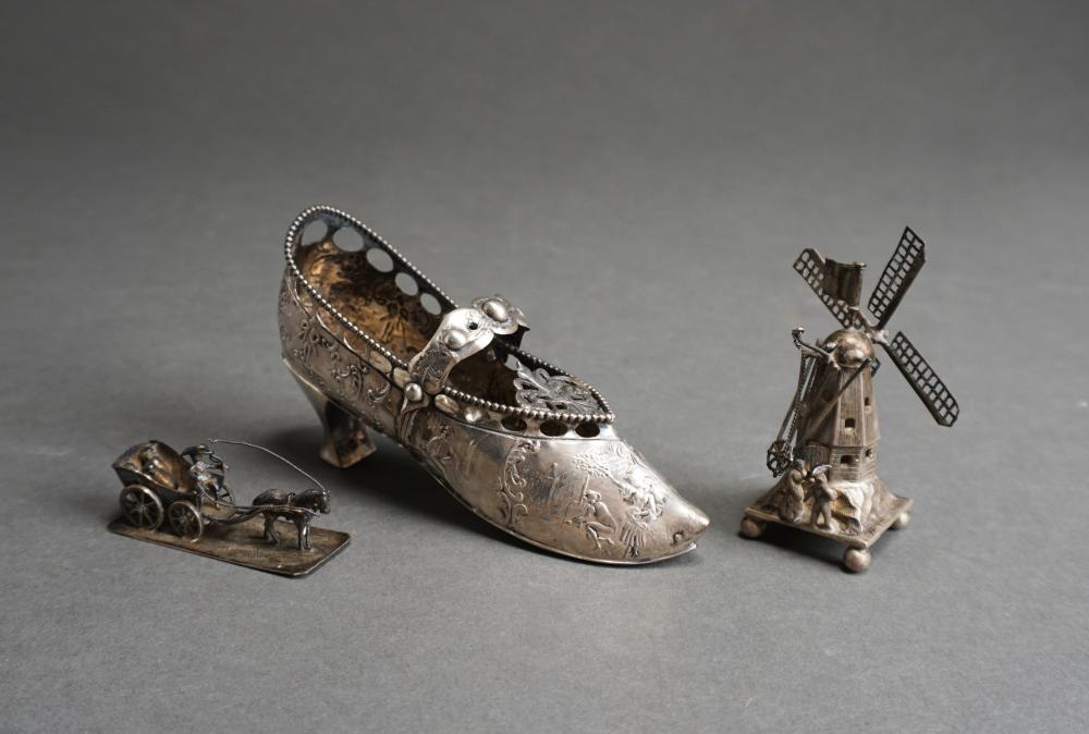 Appraisal: DUTCH -SILVER PICTORIAL EMBOSSED CLOG AND MINIATURE WINDMILL AND CART