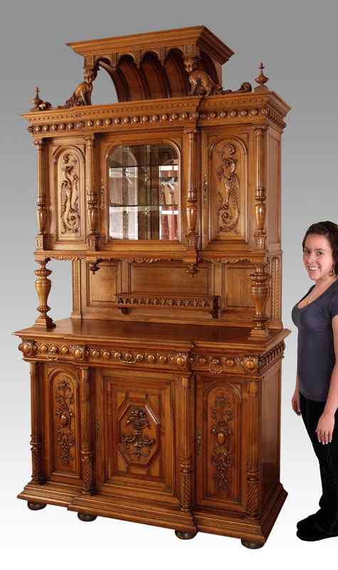 Appraisal: LARGE FRENCH WALNUT COURT CUPBOARD Two part cabinet with carved