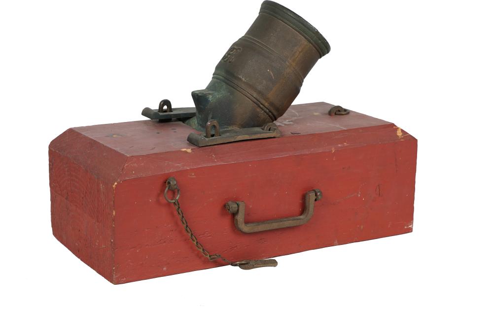 Appraisal: ENGLISH STYLE MORTAR CANNONiron cannon on a painted wood block