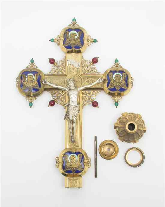 Appraisal: A Continental Brass Processional Crucifix with further enamel decoration Height