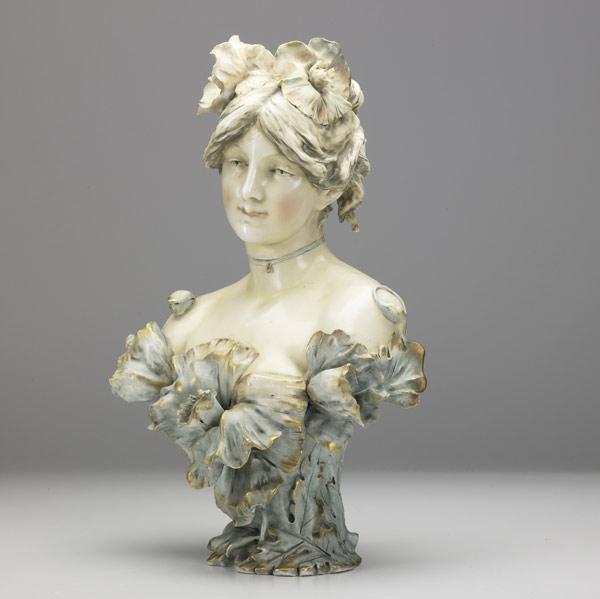 Appraisal: RIESSNER STELLMACHER KESSELAmphora porcelain bust of a lady with poppiesSee