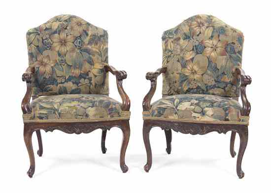 Appraisal: A Pair of French Provincial Fauteuils having needlepoint upholstered backs