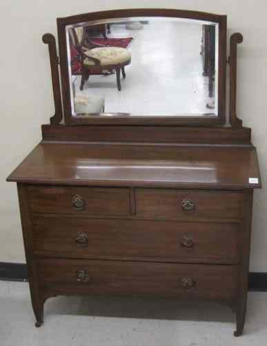 Appraisal: MAHOGANY VANITY DRESSER English early th century the four-drawer chest