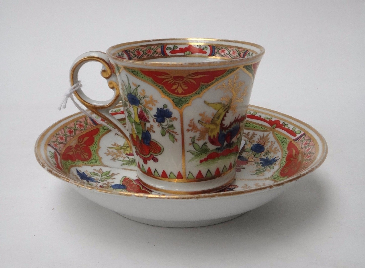 Appraisal: A Chamberlain Worcester coffee cup and saucer circa painted with