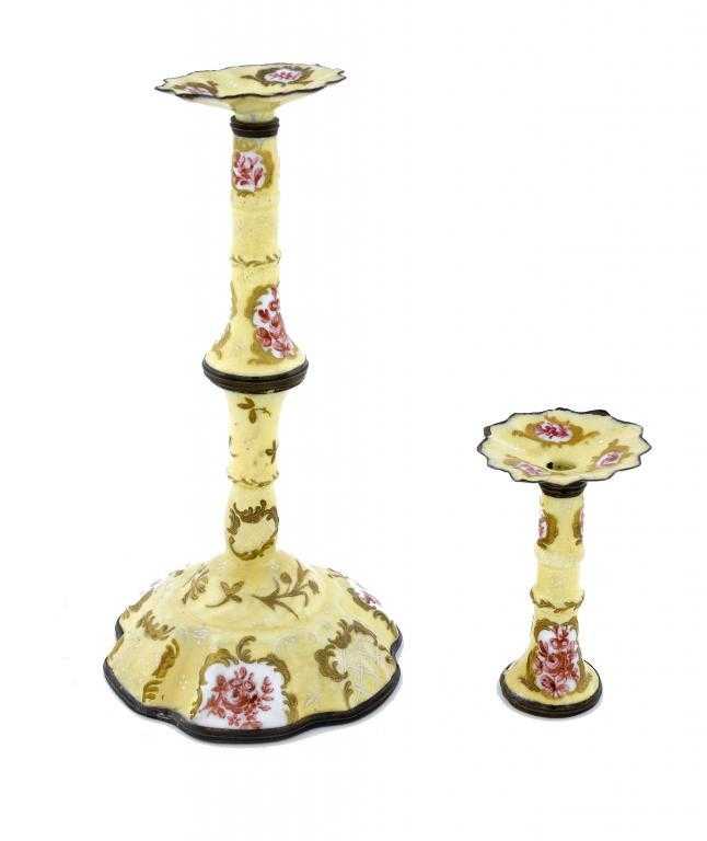 Appraisal: AN ENAMEL CANDLESTICK with red-brown reserves of flowers and white