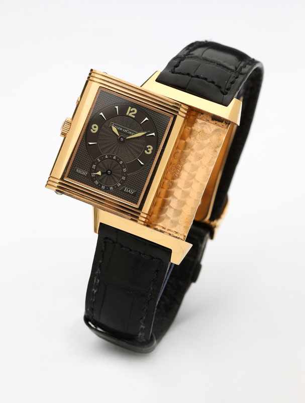 Appraisal: Rectangular reversible with two time-zone dials on one side a