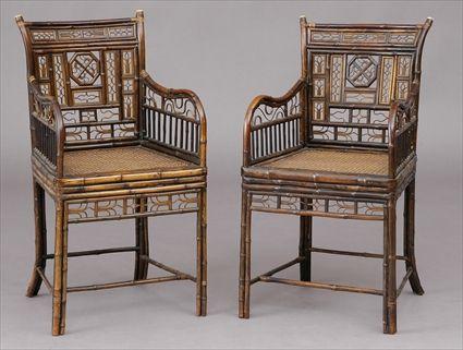 Appraisal: PAIR OF CHINESE EXPORT STAINED BAMBOO ARMCHAIRS Each curved backrest