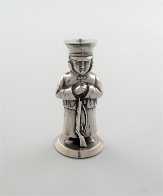 Appraisal: An Edwardian novelty cigar lighter in the form of a