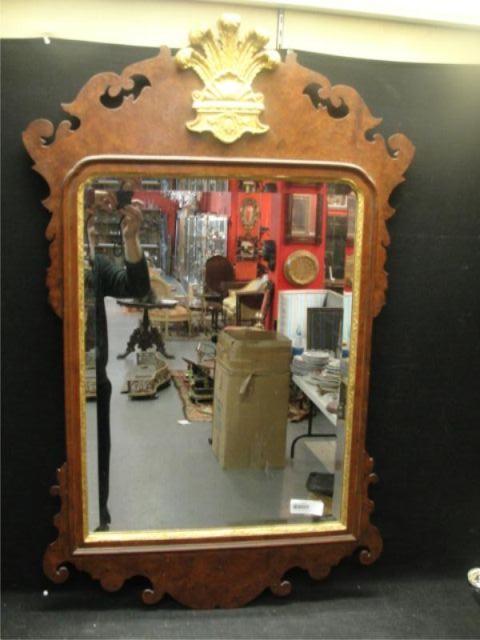 Appraisal: WILLIAMSBURG Chippendale Style Mirror Burlwood mirror with gilt Prince of