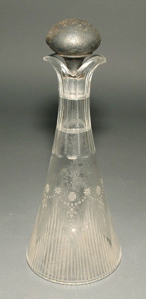 Appraisal: Cut glass decanter with sterling silver stopper h