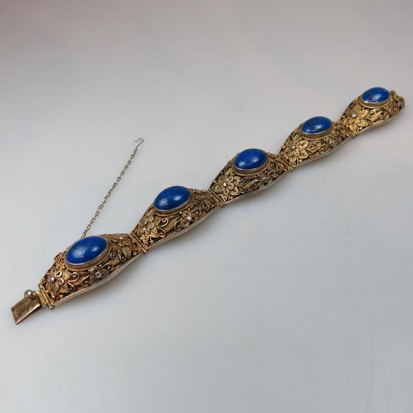 Appraisal: Chinese Silver Filigree Bracelet bezel set with oval lapis cabochons