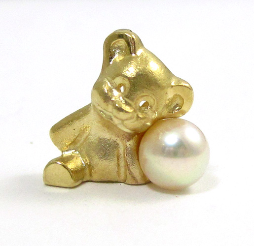 Appraisal: PEARL AND FOURTEEN KARAT GOLD PENDANT with a yellow gold