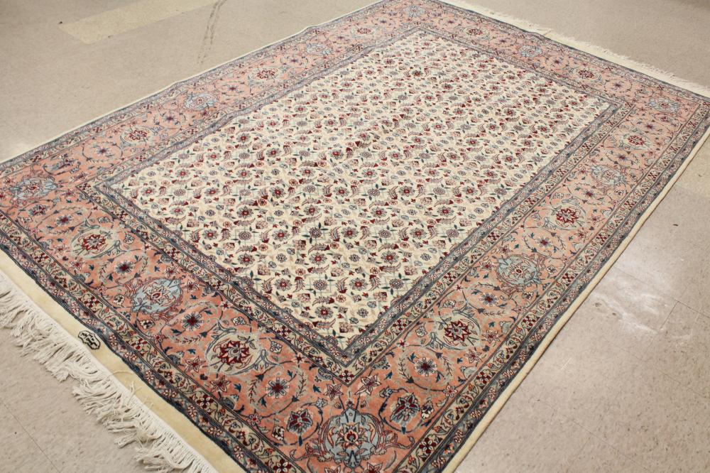 Appraisal: SIGNED AND HAND KNOTTED ORIENTAL CARPET Indo-Persian contemporary overall floral