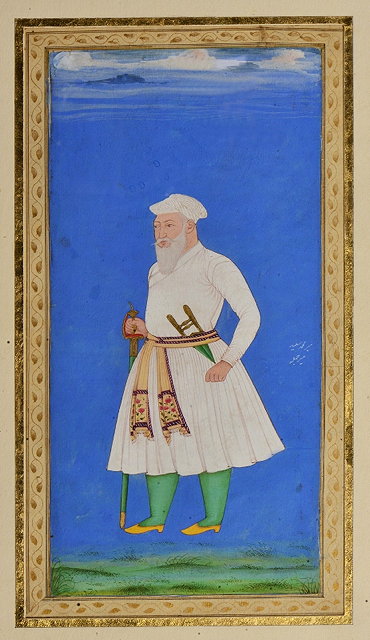 Appraisal: AN INDIAN MINIATURE PAINTED WITH BEARDED NOBLEMAN BRANDISHING A SWORD