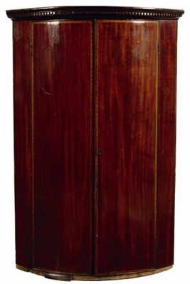 Appraisal: A George III mahogany bowfront hanging corner cupboard the pair